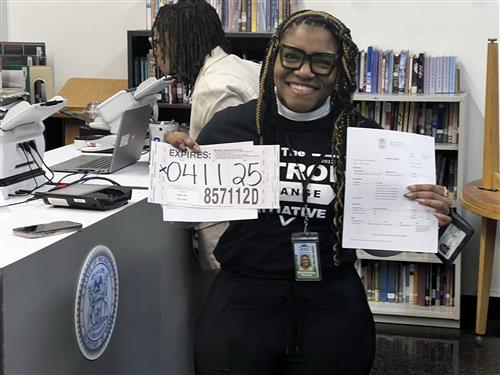 person holding completed SOS documents